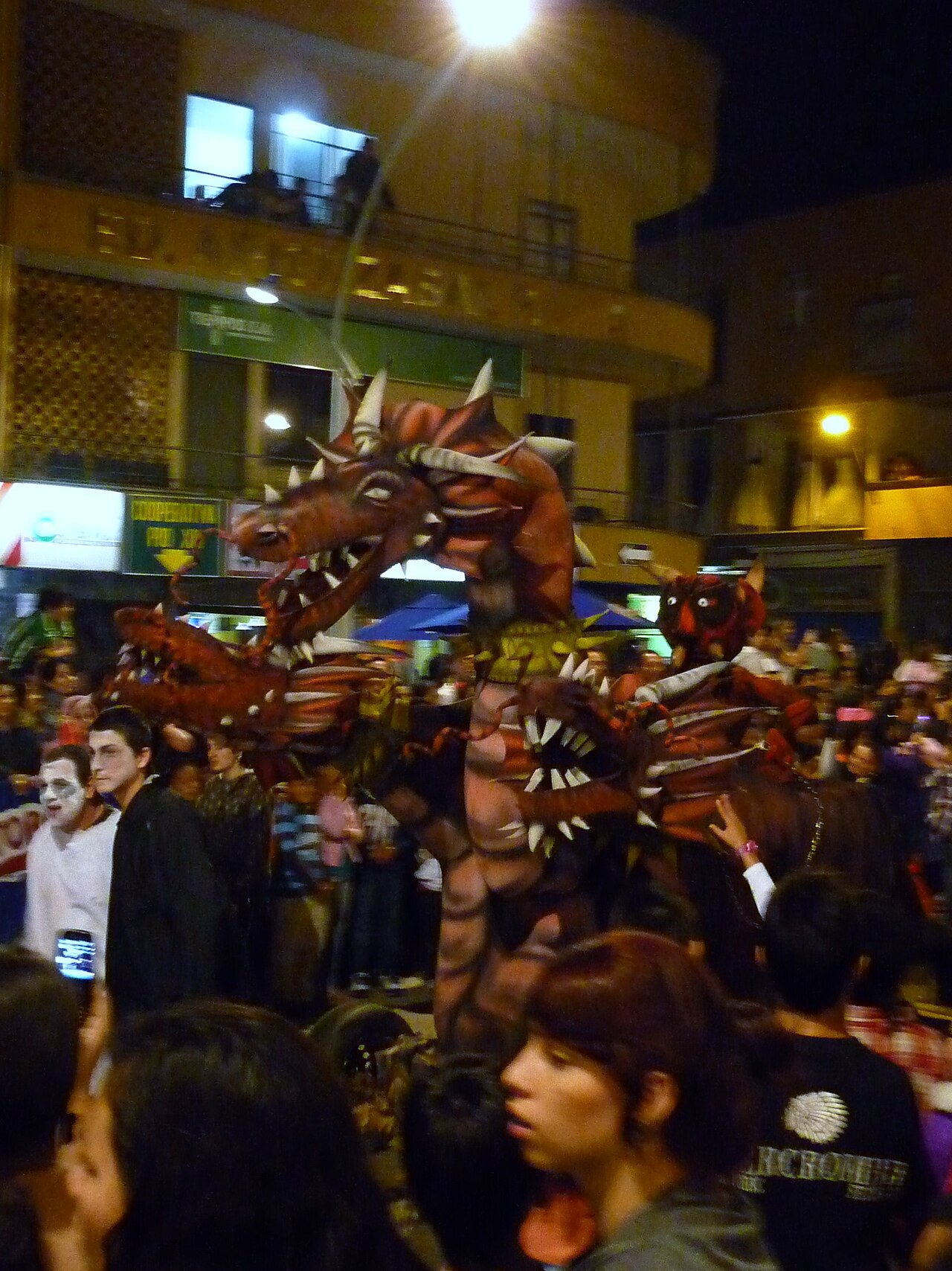 Costumed dragon figure in the Myths and Legends parade