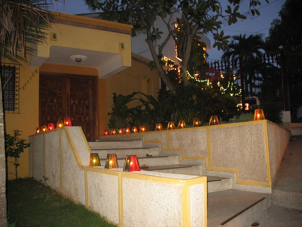 House decorated with lanterns for the Day of the Little Candles