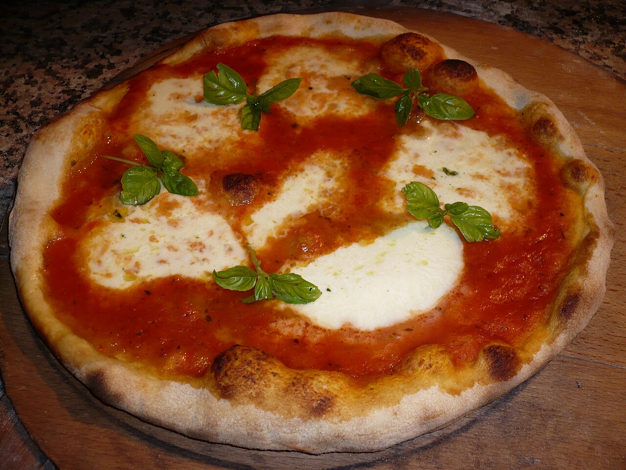 Margherita pizza with tomato, mozzarella and basil