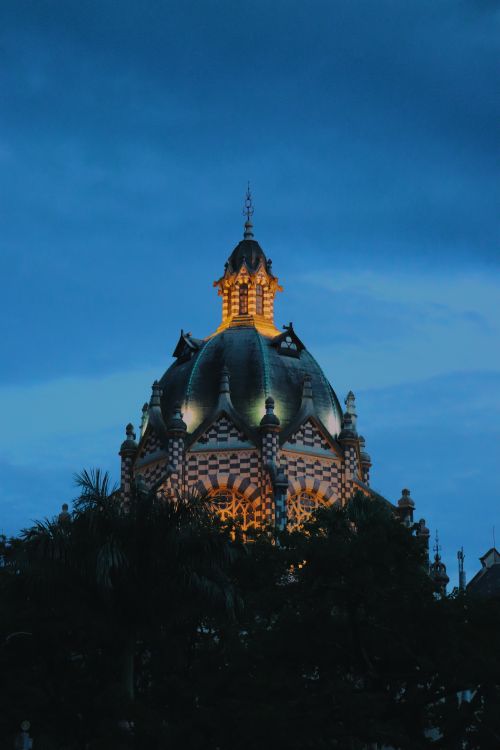 Medellín illuminated dome at twilight